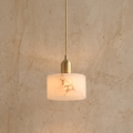 Lune Alabaster Pendant Light hero shot, designer pendant light in natural alabaster and brass
