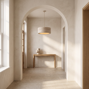 Kairi Travertine Pendant Light in an architectural hallway